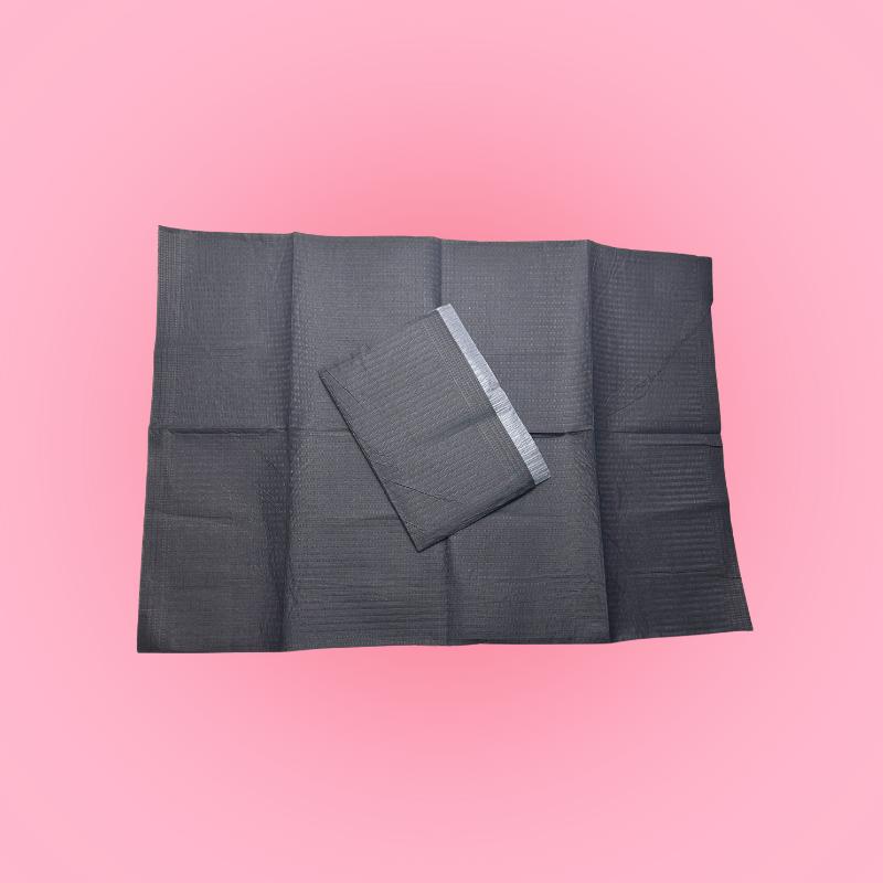 Engangsunderlag til vippebehandling – sort engangsbeskyttelse til behandlingsbriks